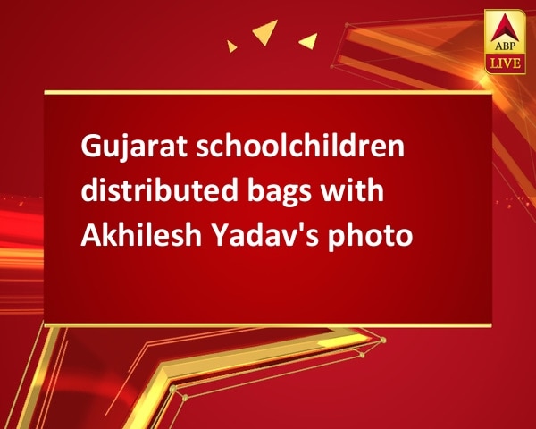 Gujarat schoolchildren distributed bags with Akhilesh Yadav's photo Gujarat schoolchildren distributed bags with Akhilesh Yadav's photo