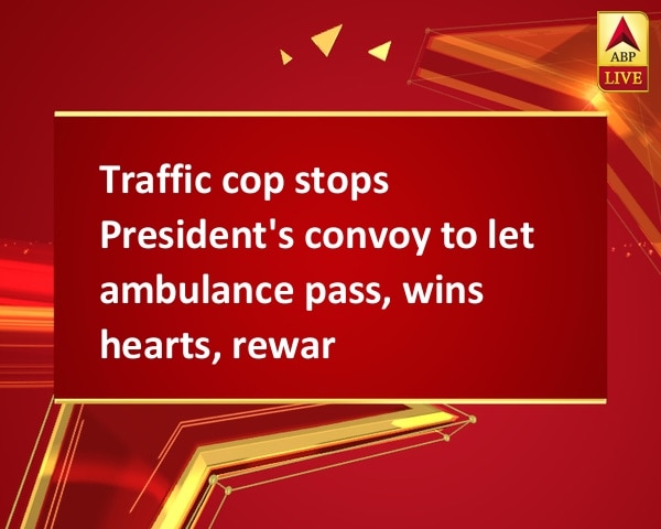 Traffic cop stops President's convoy to let ambulance pass, wins hearts, reward Traffic cop stops President's convoy to let ambulance pass, wins hearts, reward