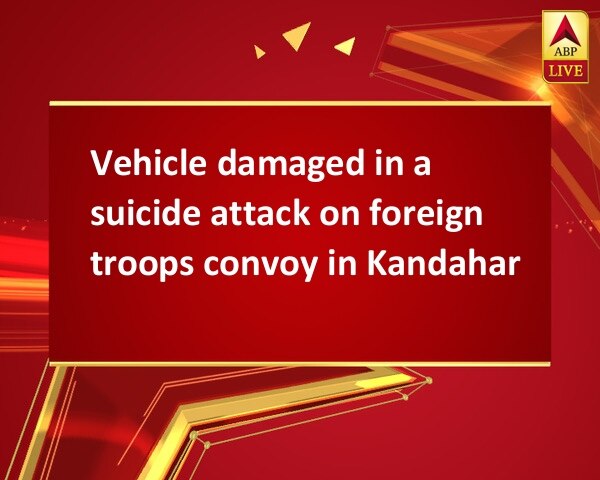 Vehicle damaged in a suicide attack on foreign troops convoy in Kandahar Vehicle damaged in a suicide attack on foreign troops convoy in Kandahar