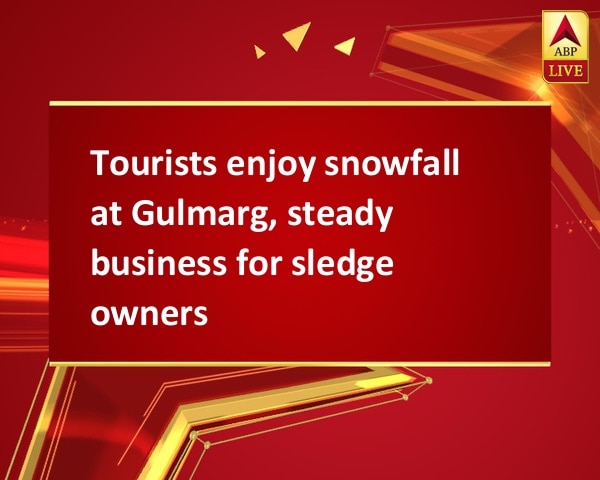 Tourists enjoy snowfall at Gulmarg, steady business for sledge owners Tourists enjoy snowfall at Gulmarg, steady business for sledge owners