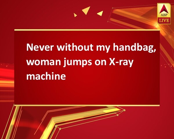 Never without my handbag, woman jumps on X-ray machine Never without my handbag, woman jumps on X-ray machine