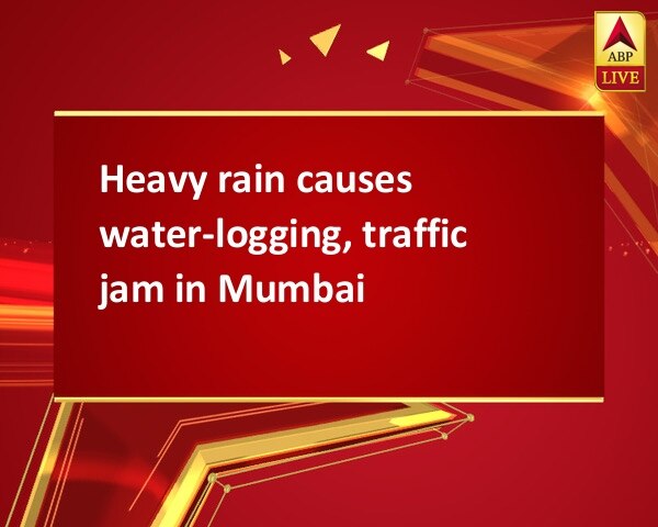 Heavy rain causes water-logging, traffic jam in Mumbai Heavy rain causes water-logging, traffic jam in Mumbai