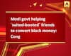 Modi govt helping `suited-booted` friends to convert black money: Cong