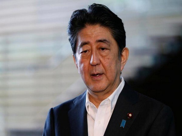Shinzo Abe under fire over Kindergarten scandal Shinzo Abe under fire over Kindergarten scandal