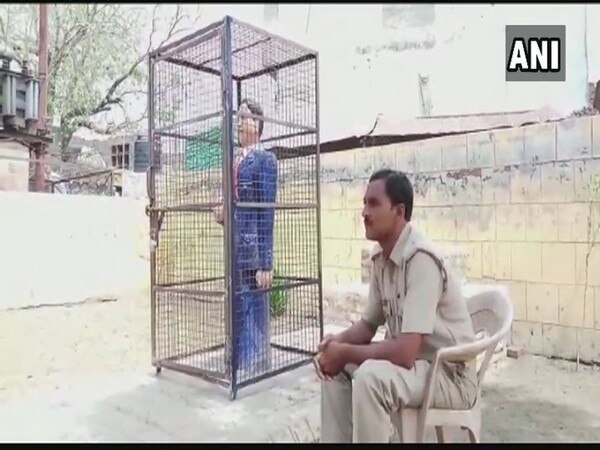 Ambedkar statue 'caged' in UP Ambedkar statue 'caged' in UP Ambedkar statue 'caged' in UP