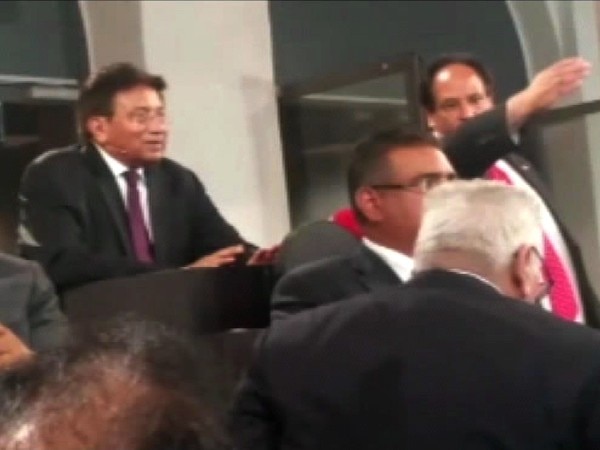Musharraf heckled by Baloch activists at 'Dialogue for Peace' event in Oslo Musharraf heckled by Baloch activists at 'Dialogue for Peace' event in Oslo