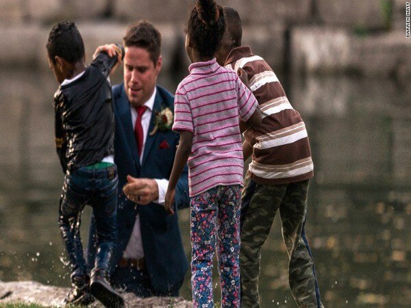 Suited-up Canadian groom saves drowning child Suited-up Canadian groom saves drowning child
