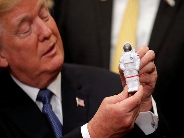 Eyeing Mars, Trump to send astronauts back to moon Eyeing Mars, Trump to send astronauts back to moon