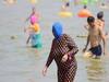 With onset of summer, \'Facekinis\' make a comeback in Chinese beaches