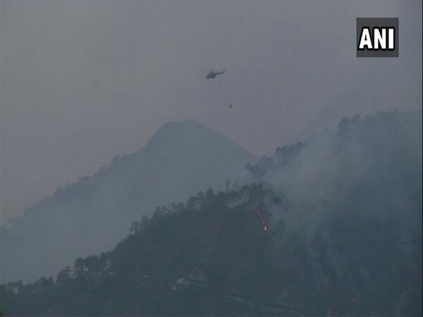 Indian Air Force douse forest fire in Trikuta Hills of Katra district Indian Air Force douse forest fire in Trikuta Hills of Katra district