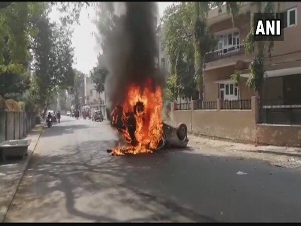 Protesters torch vehicle over death of Gujarat Dalit activist Protesters torch vehicle over death of Gujarat Dalit activist