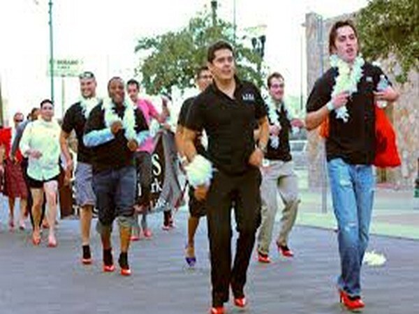 USA: Male students wear heeled shoes to stop violence against women USA: Male students wear heeled shoes to stop violence against women