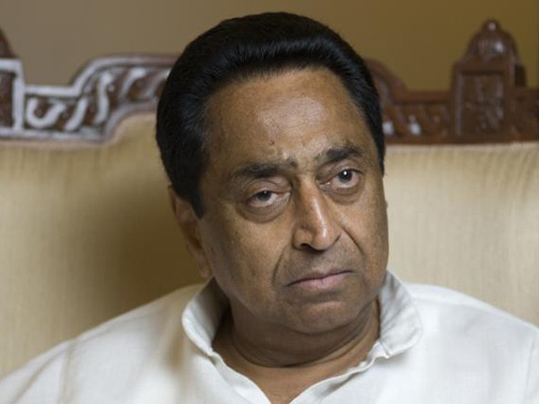 MP cop aims gun at Congress leader Kamal Nath MP cop aims gun at Congress leader Kamal Nath