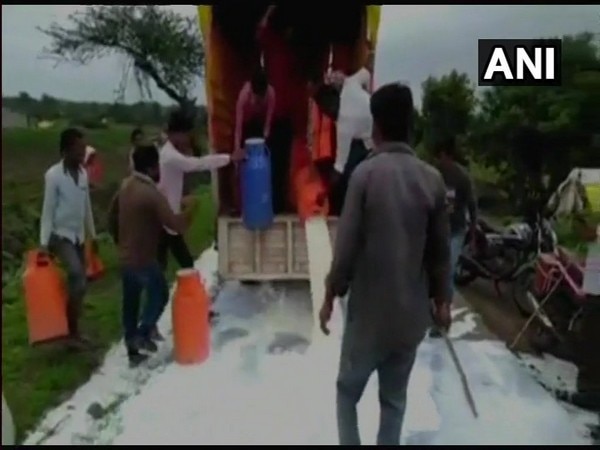 Milk spilled on roads as mark of protest demanding price hike Milk spilled on roads as mark of protest demanding price hike