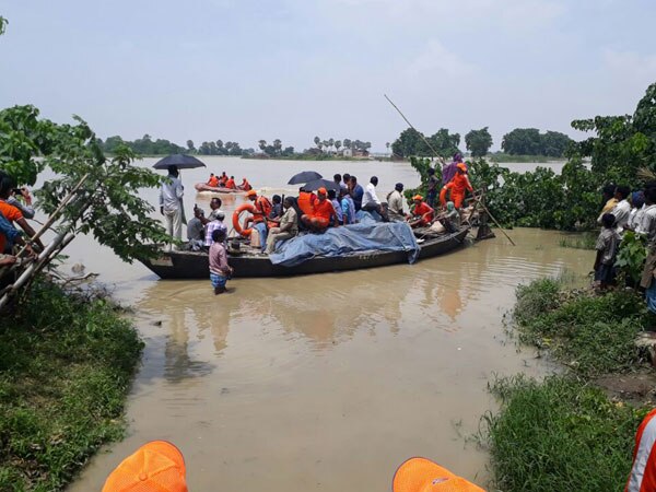 1334 people in flood-affected Assam, Bihar, UP rescued by NDRF till now 1334 people in flood-affected Assam, Bihar, UP rescued by NDRF till now