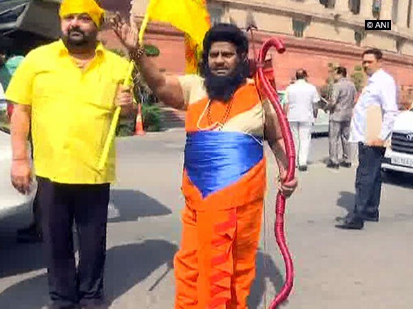 Special status to Andhra: TDP MP Sivaprasad sports 'Parashurama' look Special status to Andhra: TDP MP Sivaprasad sports 'Parashurama' look