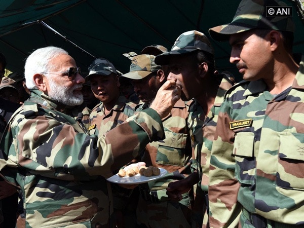 PM Modi exchanges Diwali sweets, pleasantries with soldiers in Gurez Sector PM Modi exchanges Diwali sweets, pleasantries with soldiers in Gurez Sector