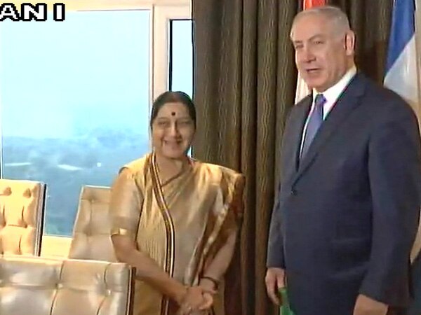 Swaraj calls on Netanyahu, discusses bilateral ties Swaraj calls on Netanyahu, discusses bilateral ties