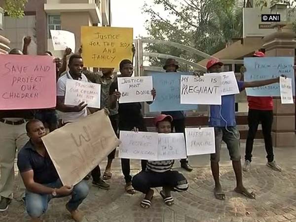 Nigerians protest outside Greater Noida school after student alleges sexual assault Nigerians protest outside Greater Noida school after student alleges sexual assault