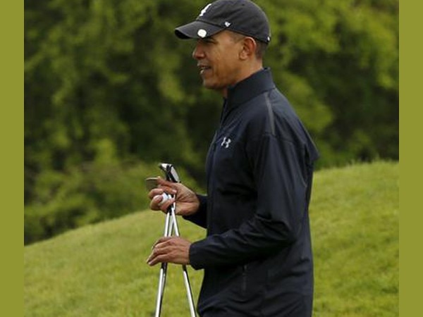 Former NZ PM beats Obama in extra holes Former NZ PM beats Obama in extra holes