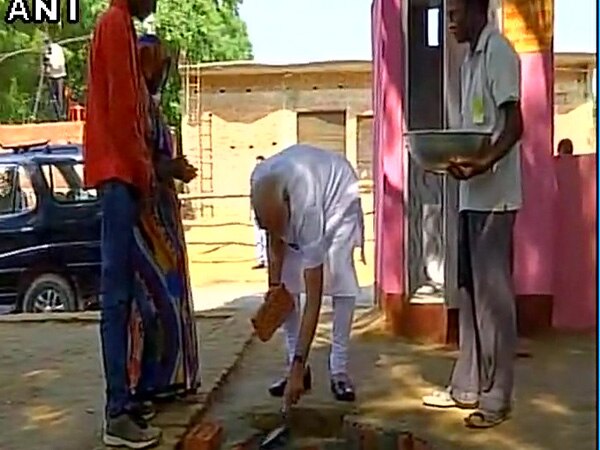PM Modi contributes in building twin pit toilet in Varanasi PM Modi contributes in building twin pit toilet in Varanasi