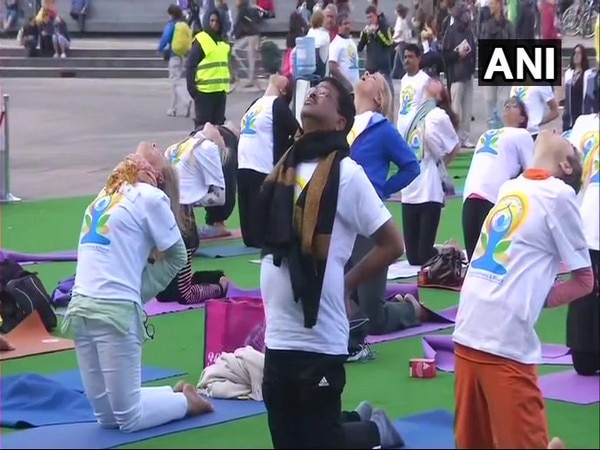 International Yoga day: Pradhan performs asanas in Berlin International Yoga day: Pradhan performs asanas in Berlin