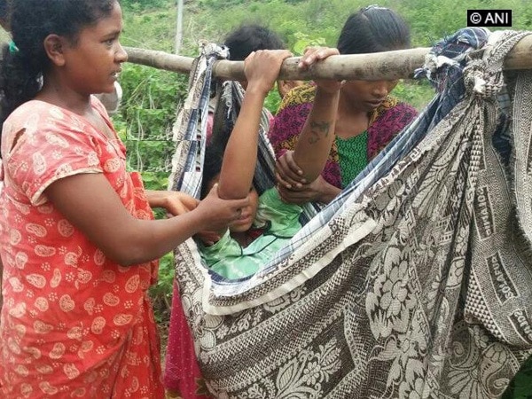 Andhra: pregnant woman carried to hospital on makeshift stretcher Andhra: pregnant woman carried to hospital on makeshift stretcher