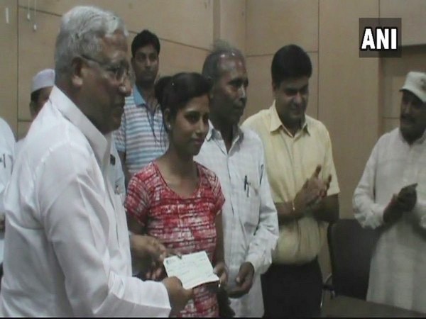 Meerut DM gives 4.5 lakh cheque to shooter Priya Singh Meerut DM gives 4.5 lakh cheque to shooter Priya Singh