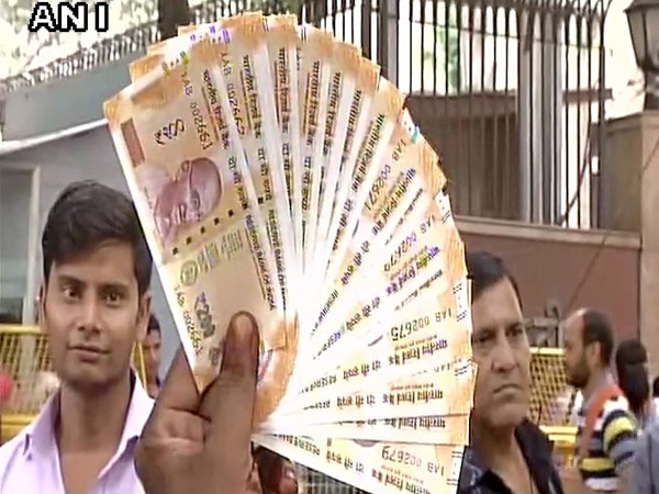 RBI introduces bright yellow Rs. 200 currency notes RBI introduces bright yellow Rs. 200 currency notes