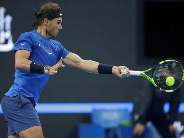 Rafael Nadal marches into Paris Masters quarters Rafael Nadal marches into Paris Masters quarters