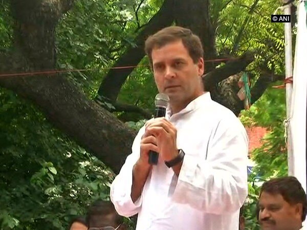 Rahul Gandhi accuses BJP govt of grabbing farmer's land Rahul Gandhi accuses BJP govt of grabbing farmer's land