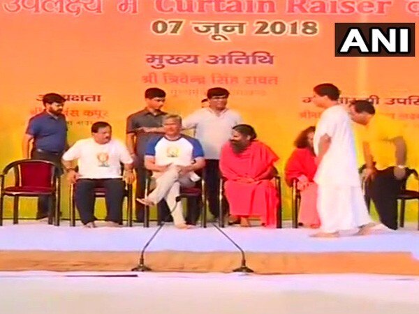 Ramdev, U'khand CM rehearse for International Yoga Day Ramdev, U'khand CM rehearse for International Yoga Day