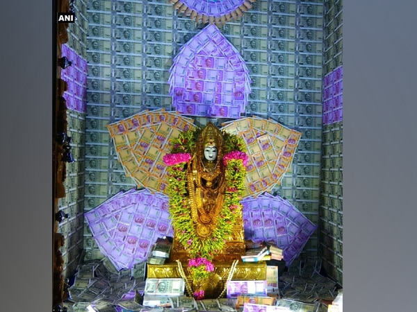 Idol in Coimbatore temple decorated with currency and diamonds Idol in Coimbatore temple decorated with currency and diamonds