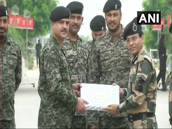 BSF, Pakistani Rangers exchange sweets to celebrate Eid BSF, Pakistani Rangers exchange sweets to celebrate Eid