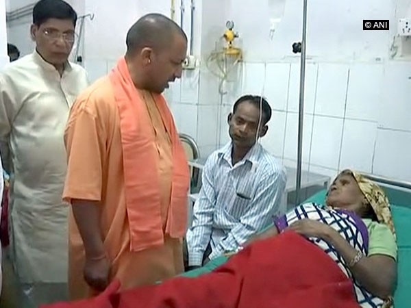 Yogi Adityanath meets rain, dust storm affected people at Agra hospital Yogi Adityanath meets rain, dust storm affected people at Agra hospital