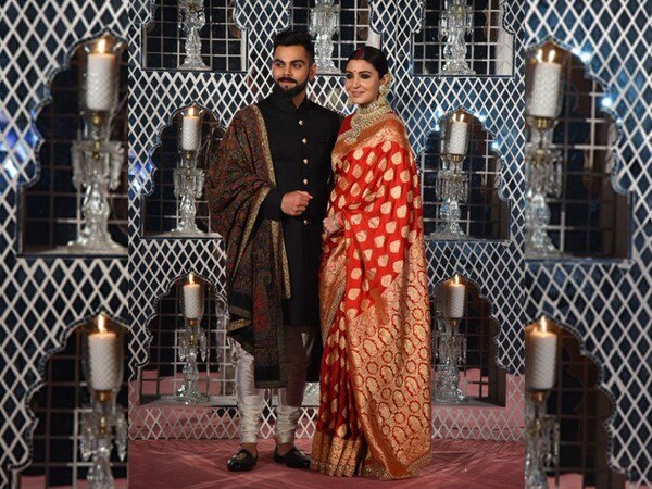 Anushka, Virat mesmerise in their traditional best at wedding reception Anushka, Virat mesmerise in their traditional best at wedding reception