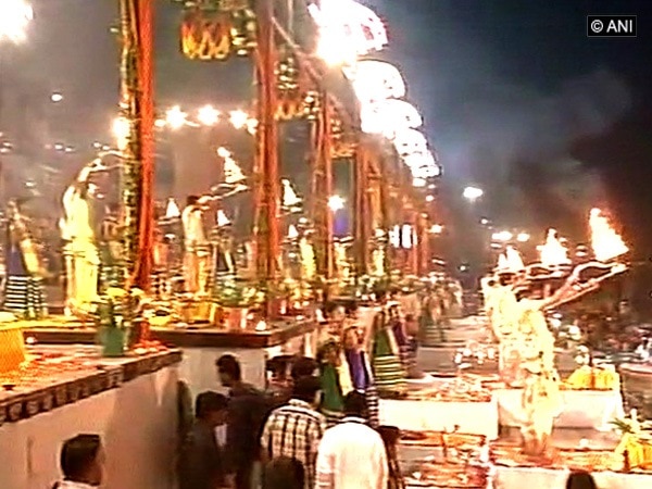 People celebrate Dev Deepavali at Ganga Ghat in Varanasi People celebrate Dev Deepavali at Ganga Ghat in Varanasi