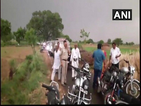 Tree falls in front of Hema Malini's convoy in UP Tree falls in front of Hema Malini's convoy in UP