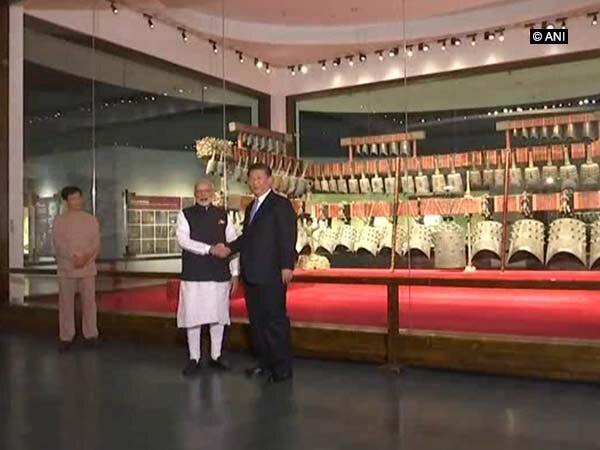 Xi takes PM Modi on museum tour ahead of 'informal' summit Xi takes PM Modi on museum tour ahead of 'informal' summit