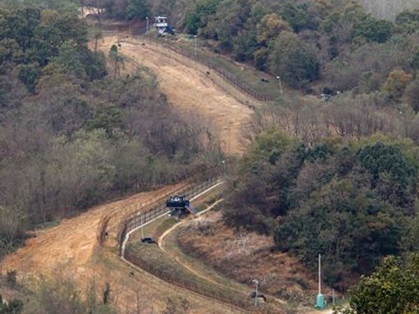N Korean soldier defects across demilitarised zone N Korean soldier defects across demilitarised zone