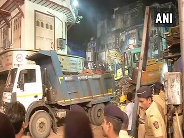 Bhendi Bazaar building collapse: 10 fire engines, 70 fire personnel, 16 dumpers still carrying operations at accident site Bhendi Bazaar building collapse: 10 fire engines, 70 fire personnel, 16 dumpers still carrying operations at accident site