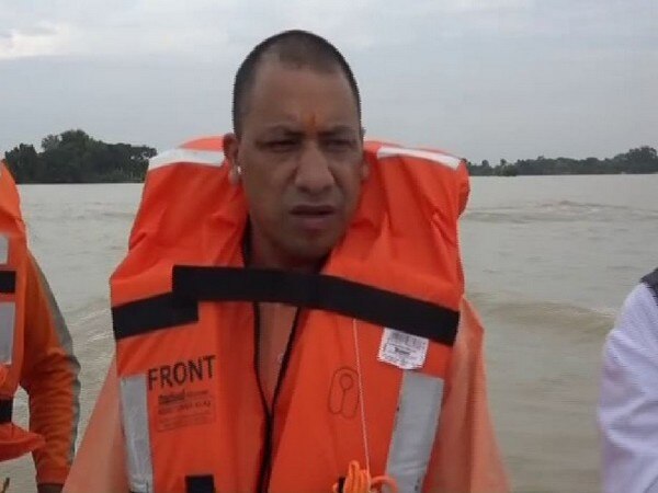 UP: CM Yogi visits flood affected areas, assures assistance in rehabilitation UP: CM Yogi visits flood affected areas, assures assistance in rehabilitation