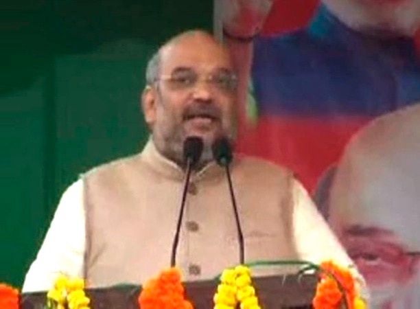 BJP chief Amit Shah targets Hooda, says he was serving 'Delhi ke damaad' BJP chief Amit Shah targets Hooda, says he was serving 'Delhi ke damaad'