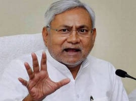 Ban liquor if you are serious about yoga: Nitish dares PM Modi Ban liquor if you are serious about yoga: Nitish dares PM Modi