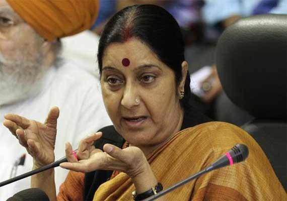 Swaraj assures aid for Russian youth forced to beg outside TN Swaraj assures aid for Russian youth forced to beg outside TN