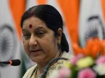Sushma asks UP CM Akhilesh to help protesting Russian daughter-in-law