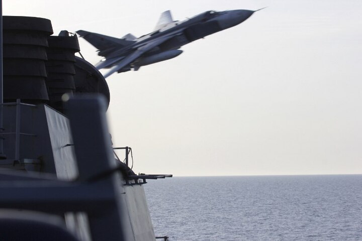 Russian jets 'buzzed' US warship in Baltic Sea as they fly at a height of just 30 feet above it Russian jets 'buzzed' US warship in Baltic Sea as they fly at a height of just 30 feet above it