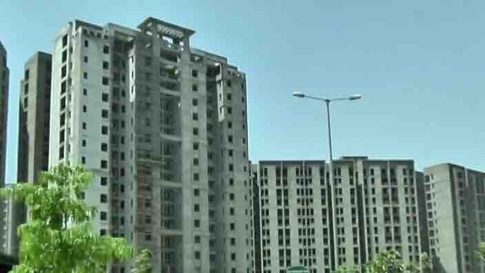 GST on under-construction flats slashed to 5%; affordable housing to attract 1% Relief for home buyers: GST on under-construction flats, affordable housing reduced