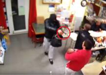 Woman of steel: Watch lady holding baby fights off gun wielding robber