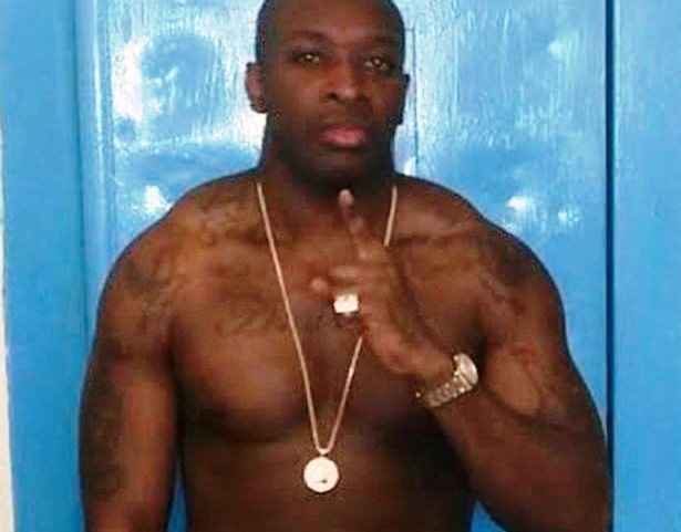 Drugs & guns: Gangster serving 27 years poses with Rolex watch & Versace bling in prison Drugs & guns: Gangster serving 27 years poses with Rolex watch & Versace bling in prison